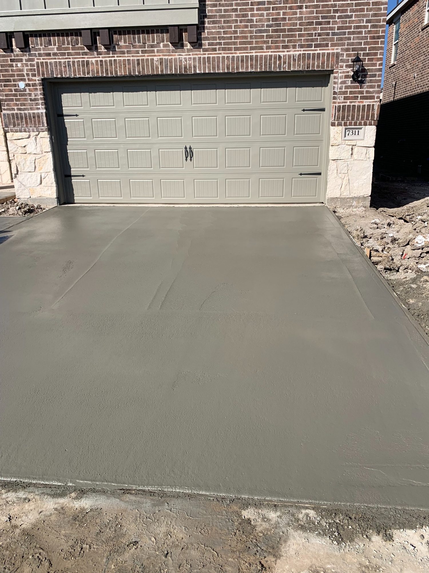 New driveway and walkway concrete